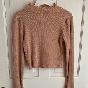 Light pink turtle neck with flare sleeves